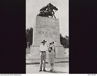 CAIRO, EGYPT, 1940-1941. PRIVATE PAUL DELPRATT, WOUNDED AT TOBRUK AND CONVALESCING AT 2/2ND AUSTRALIAN GENERAL HOSPITAL AT KANTARA, EGYPT, STANDING BY THE MEMORIAL TO AUSTRALIANS AND NEW ZEALANDERS ..