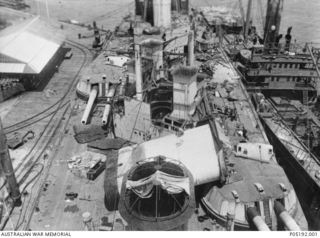 Portrait showing the breaking up of HMAS Australia prior to being scuttled off Sydney Heads in 1924. HMAS Australia was an Indefatigable class battlecruiser laid down by John Brown and company of ..