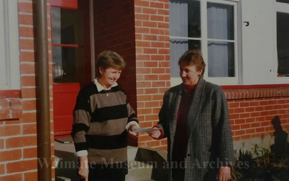 Presentation between Beverley Shepherd and Marian Taylor