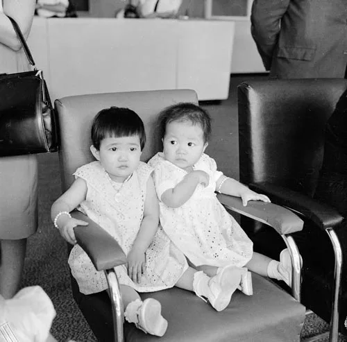 Chinese girls arriving in Wellington for adoption, 1963