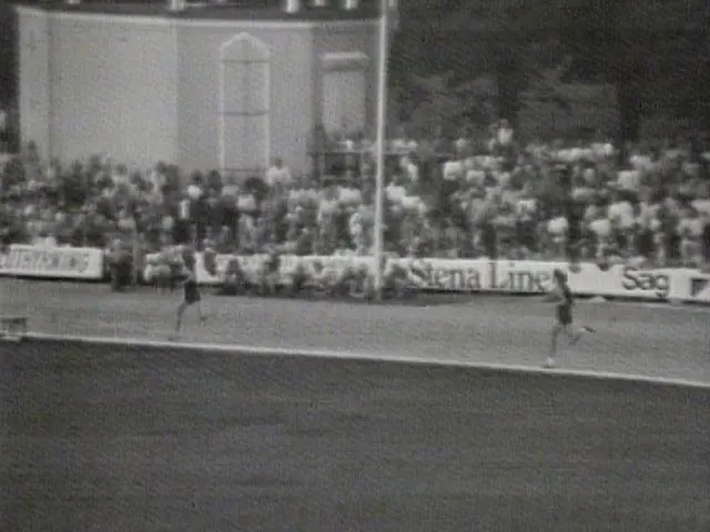 John Walker breaks the mile record