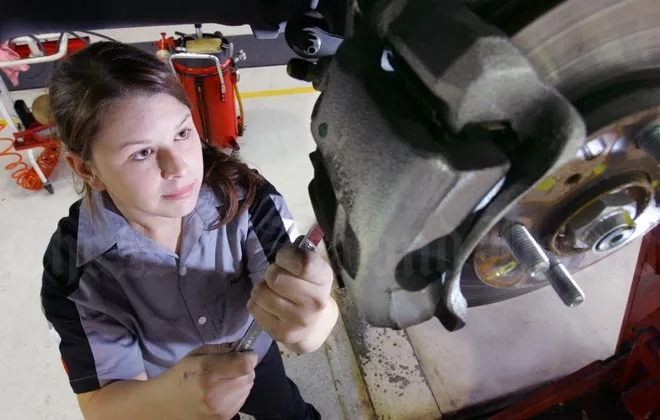 Woman automotive apprentice