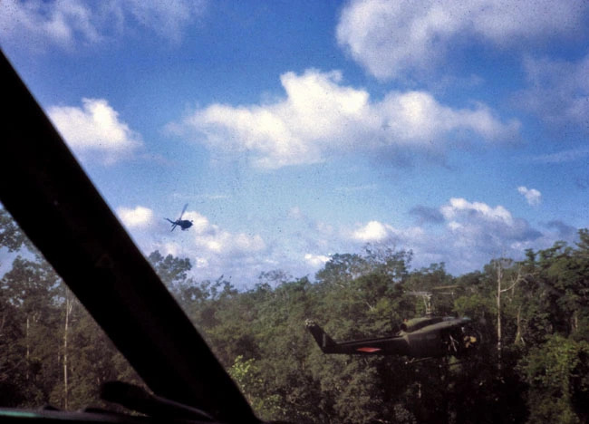 Helicopter gunship makes firing pass - SAS 'hot extraction'