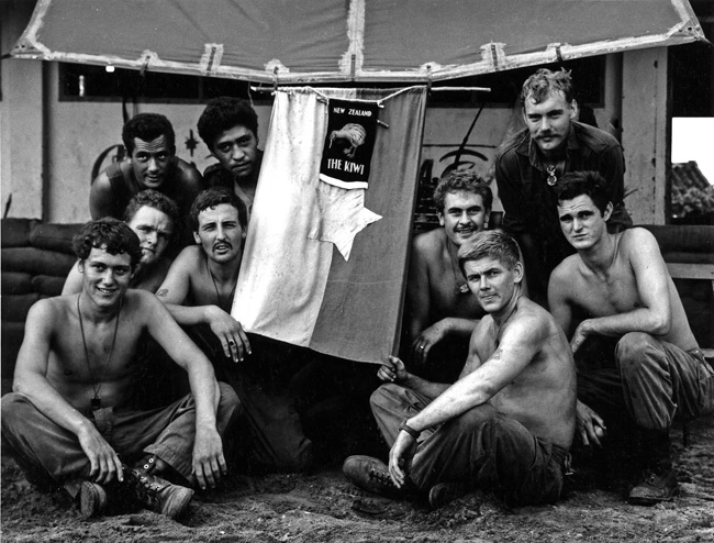 New Zealand soldiers with North Vietnamese flag