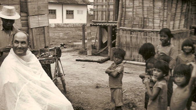 Haircut at Montagnard village - Ken Treanor