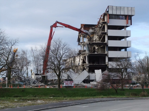 Ernst & Young building with machinery