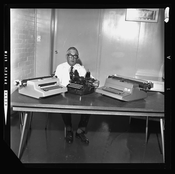 Harry Haughan with typewriters