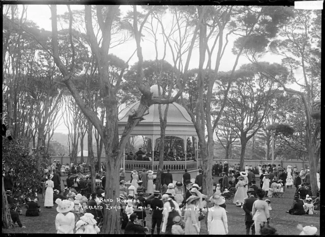 People listening to the band playing at the permanent band rotunda during the Auckland Exhibition, Auckland Domain