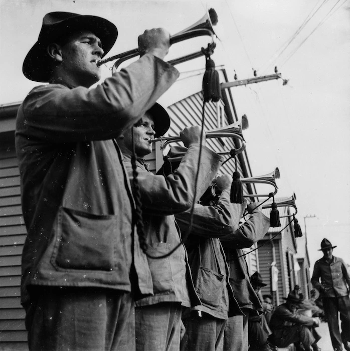 Unidentified soldiers playing a reveille on bugles