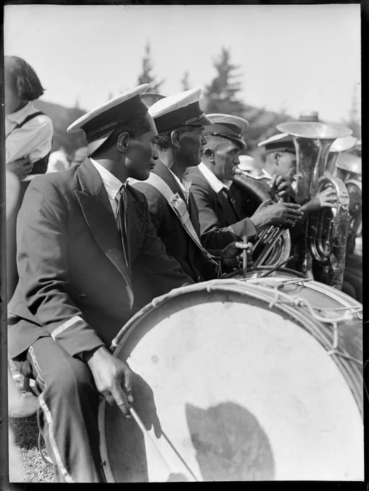 Māori musicians playing drums and brass instruments, location unidentified